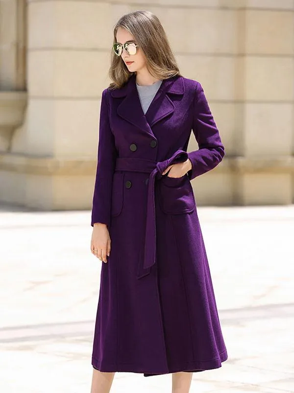 Chic double-breasted winter coat for women with lapel, full length, and belted design