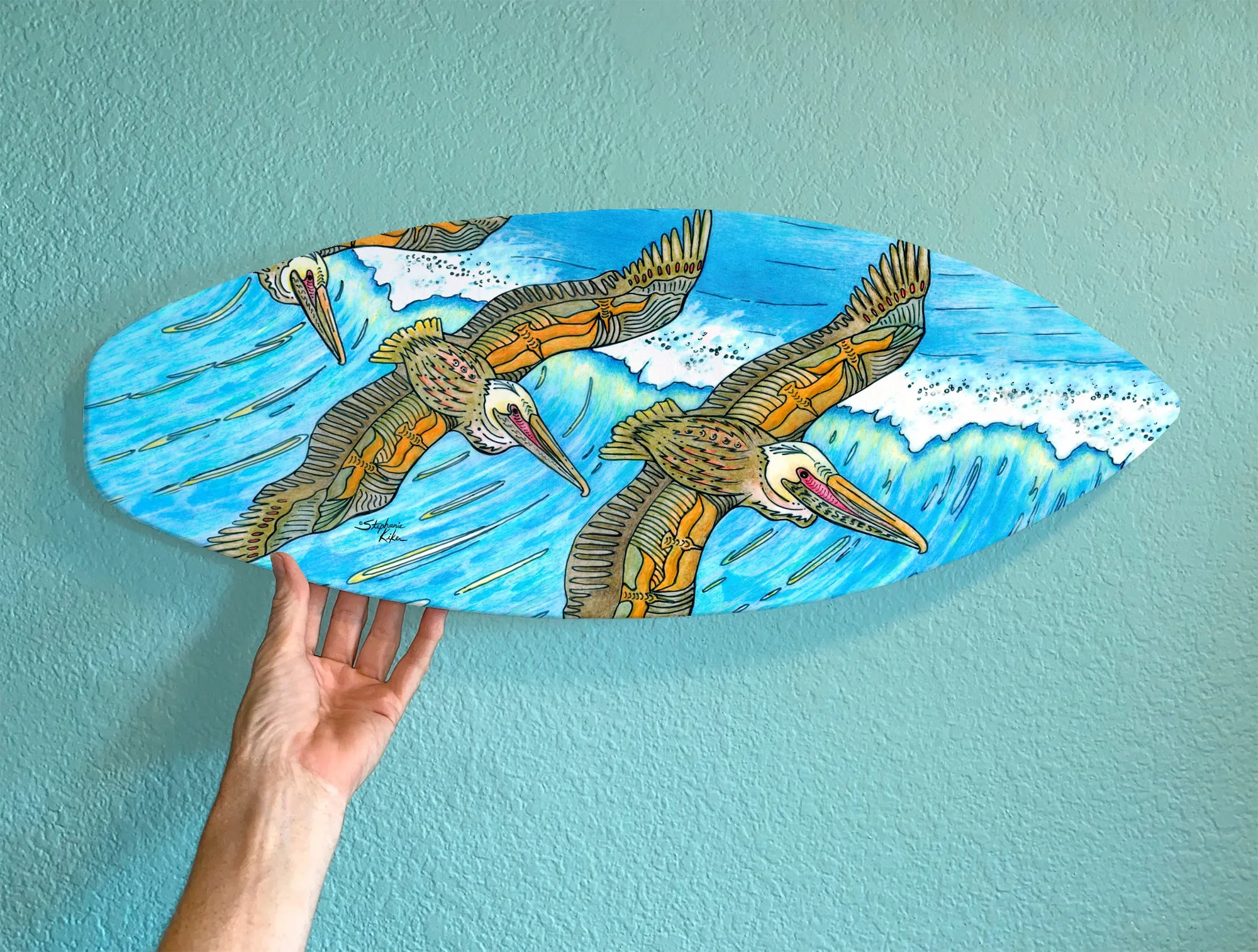 Surfboard Wall Art with Wings Flying over Waves