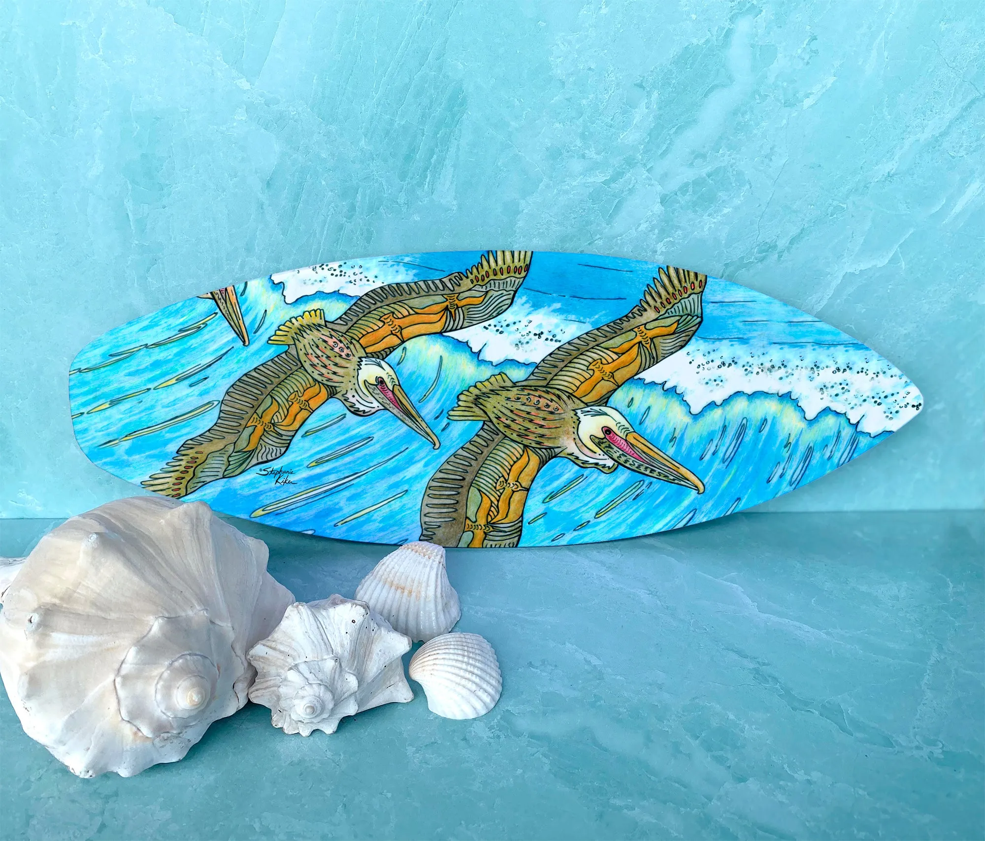 Surfboard Wall Art with Wings Flying over Waves