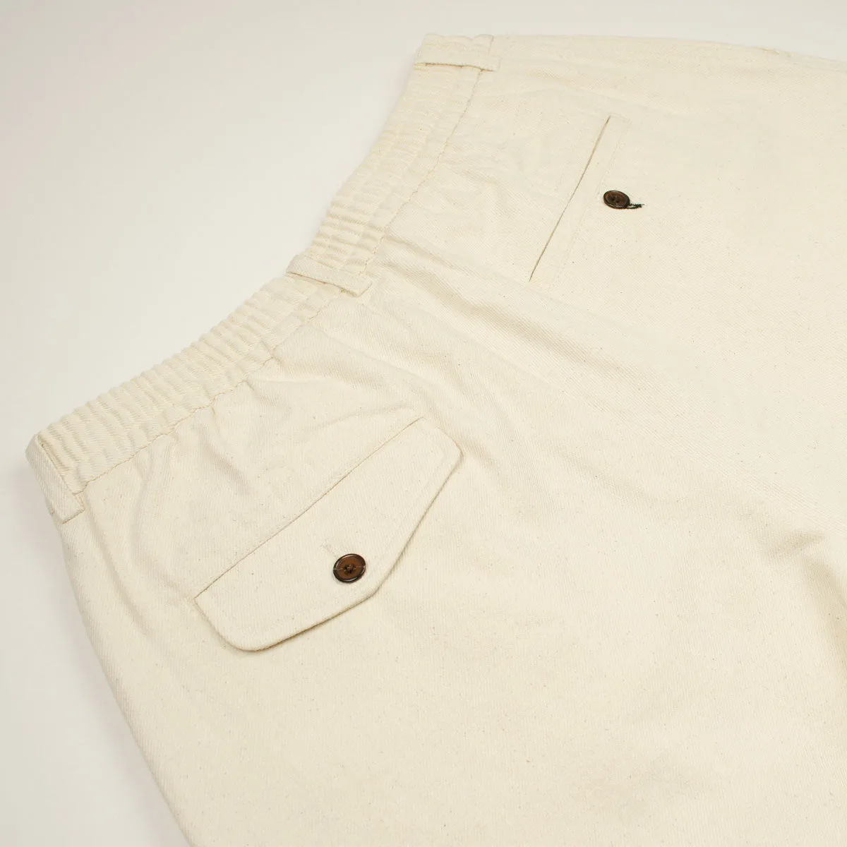 Ecru Pleated Track Shorts by Universal Works Made of Recycled Cotton